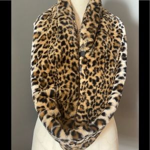 Super soft faux infinity neck wrap by CK.  This is 29” long folded in half X 8”